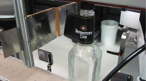 Wine and distilled spirits labeler